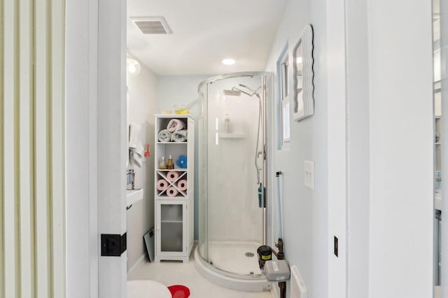 bathroom with an enclosed shower