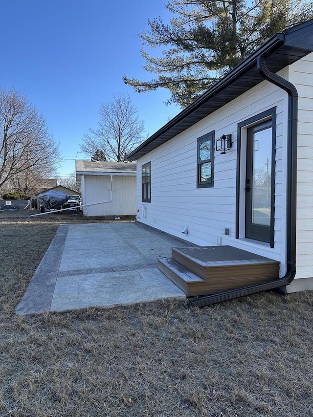 view of home's exterior with a patio area