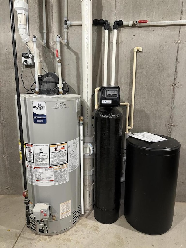 utility room with gas water heater