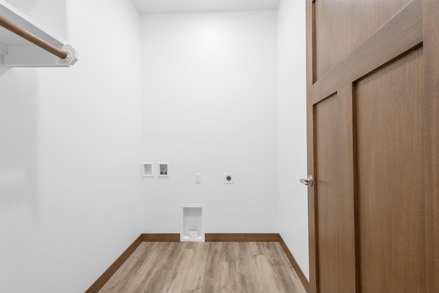 clothes washing area with hookup for an electric dryer, light wood-type flooring, and hookup for a washing machine