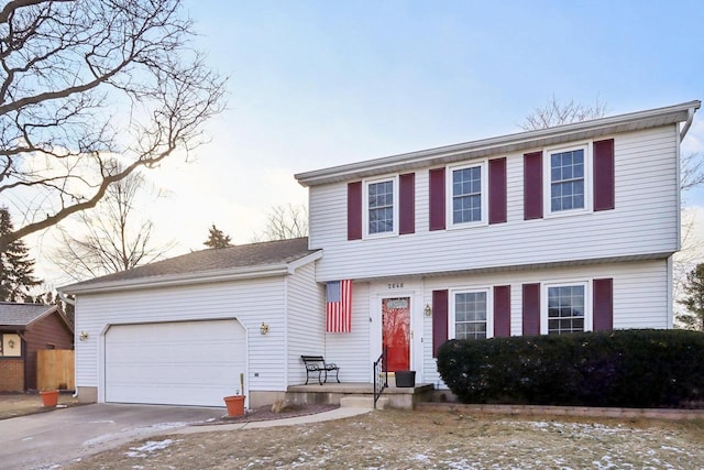 view of front of property with a garage