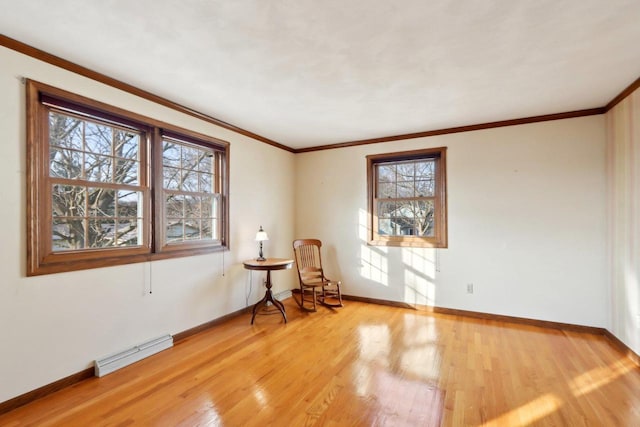 sitting room with light hardwood / wood-style flooring, ornamental molding, and a baseboard radiator