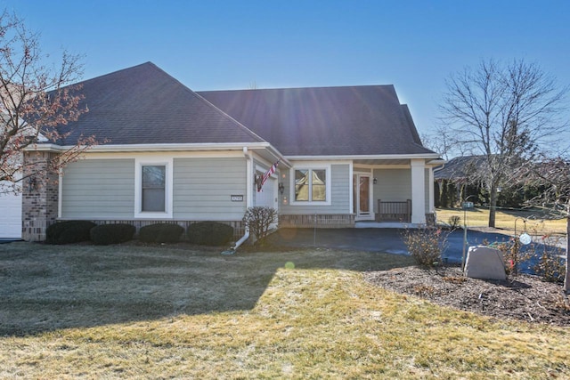 view of front of home featuring a front lawn and a porch