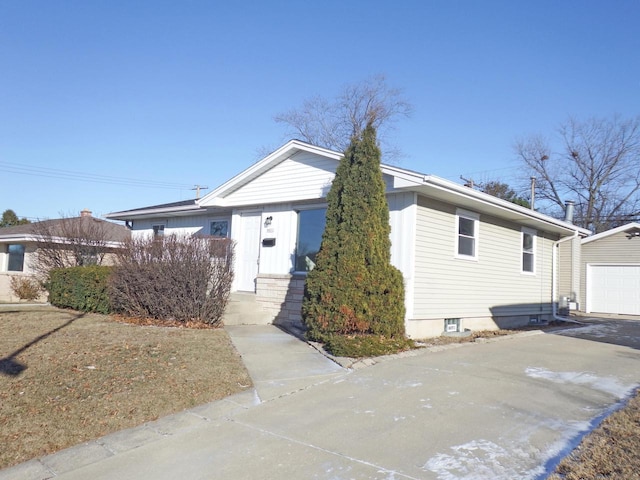 view of front of house with an outbuilding and a garage