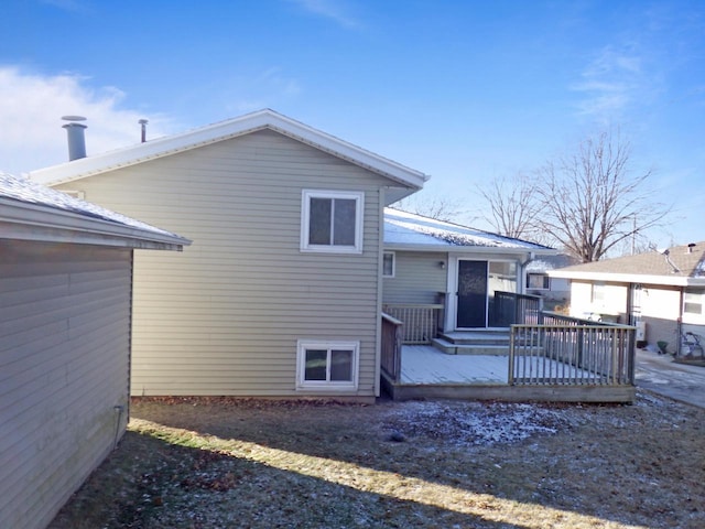 rear view of house with a deck