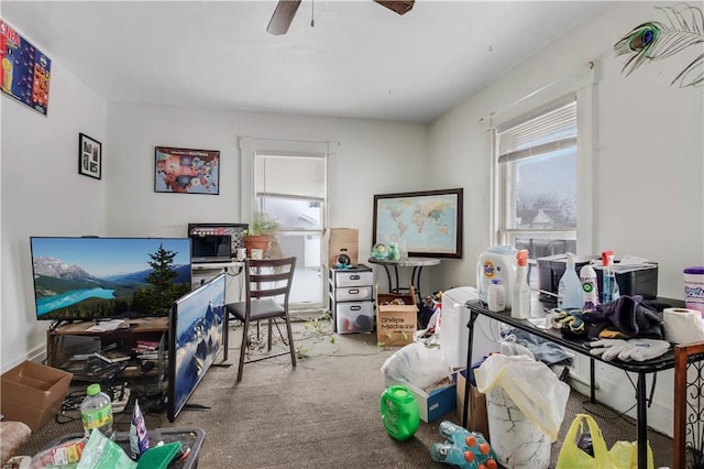 office space with carpet floors and ceiling fan