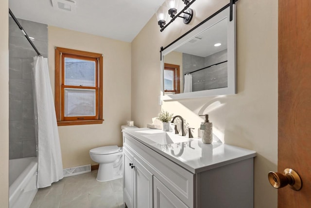 full bathroom with tile patterned floors, vanity, toilet, and shower / bath combination with curtain