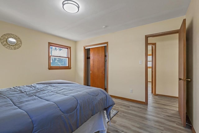 bedroom featuring light wood-type flooring