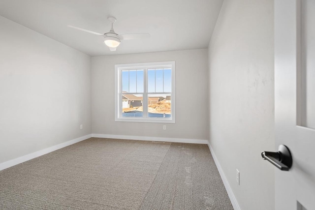 carpeted empty room with ceiling fan