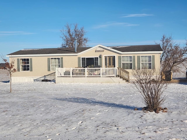 view of front of house featuring a deck