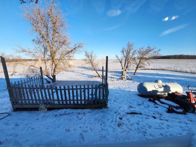 view of yard layered in snow