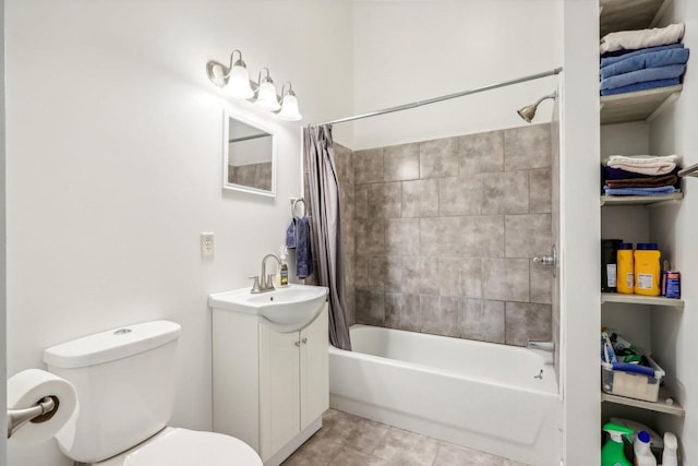 full bathroom featuring tile patterned flooring, toilet, vanity, and shower / bath combination with curtain