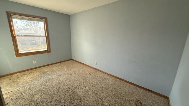 view of carpeted spare room