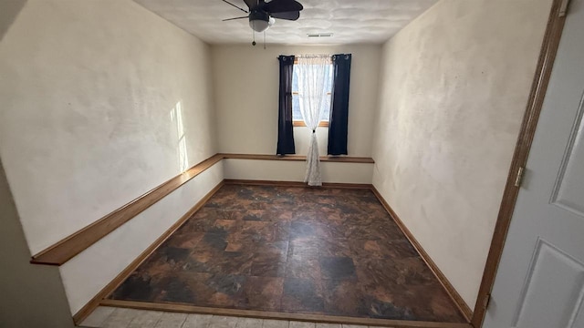 empty room featuring ceiling fan