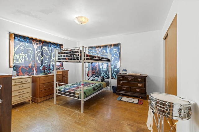 bedroom with wood-type flooring