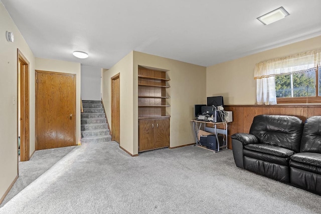 living room featuring light colored carpet