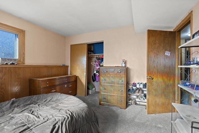 carpeted bedroom featuring a closet