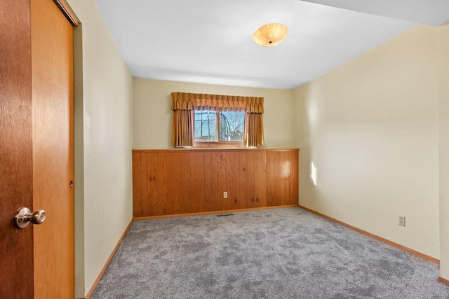 empty room with light colored carpet