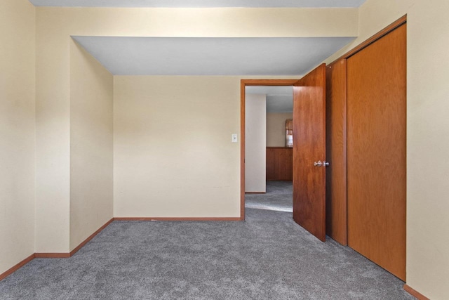 unfurnished room with carpet