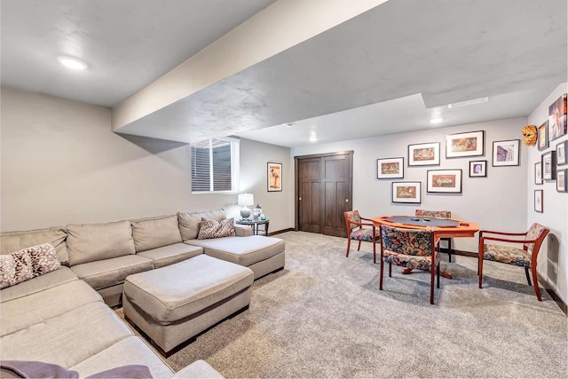 living room featuring light colored carpet