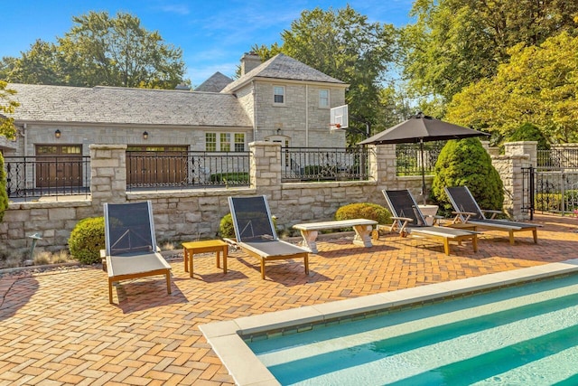 exterior space featuring basketball hoop