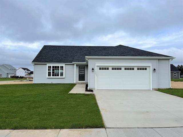 single story home featuring a garage and a front yard