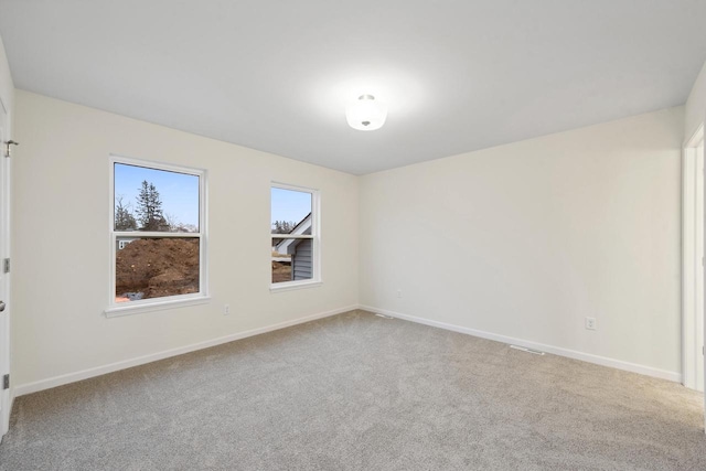 empty room with carpet floors