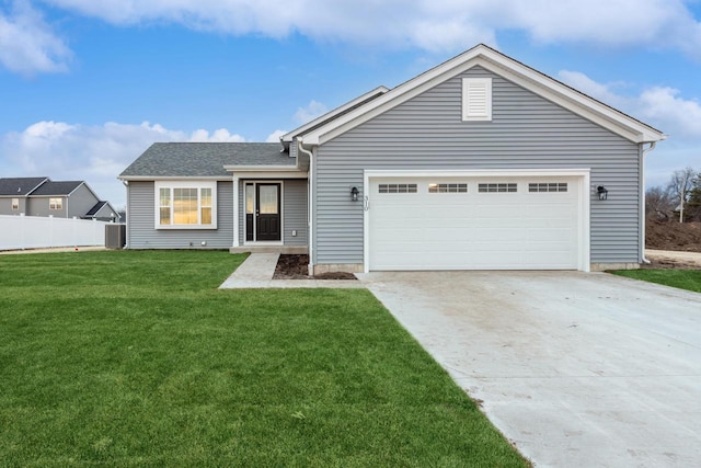 ranch-style home with a garage and a front lawn