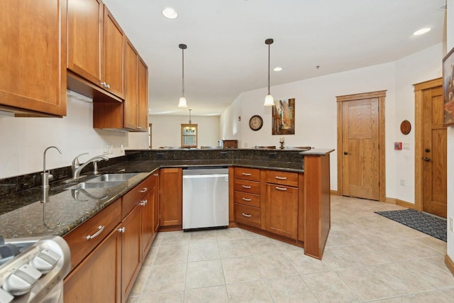 kitchen featuring pendant lighting, range, dishwasher, dark stone countertops, and kitchen peninsula