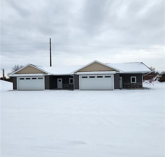 single story home with a garage