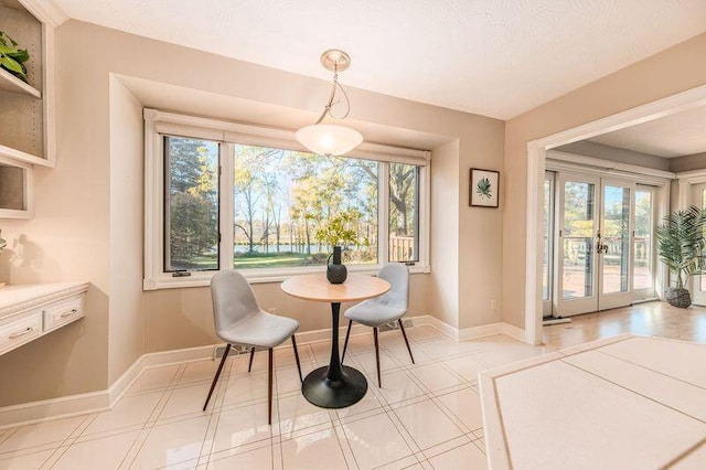 dining space featuring a healthy amount of sunlight