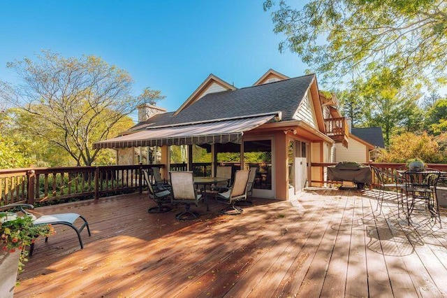 wooden terrace with grilling area