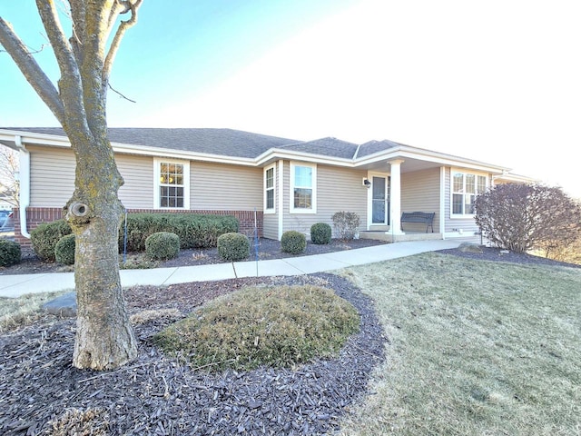 single story home with a front yard