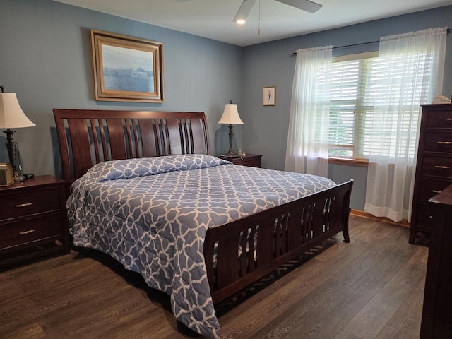 bedroom with hardwood / wood-style flooring and ceiling fan