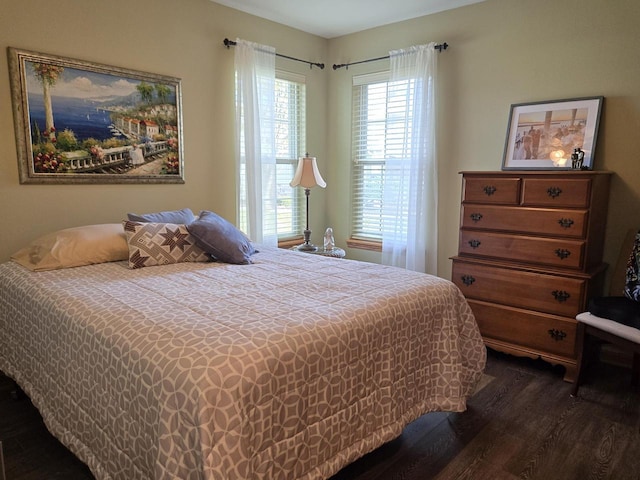 bedroom featuring dark hardwood / wood-style floors