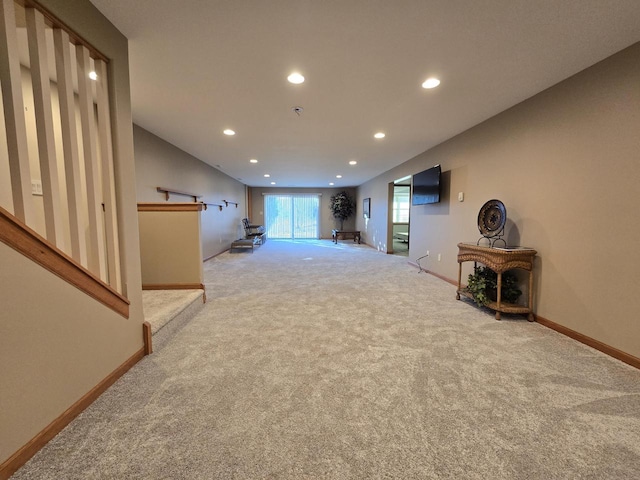 unfurnished living room featuring carpet