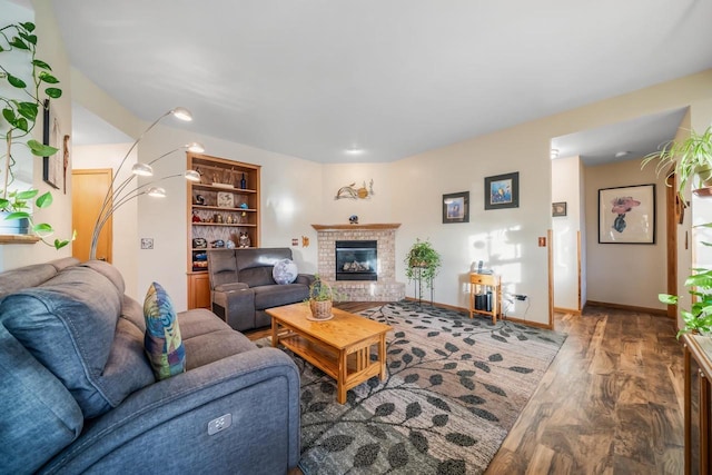 living room featuring hardwood / wood-style floors and a fireplace