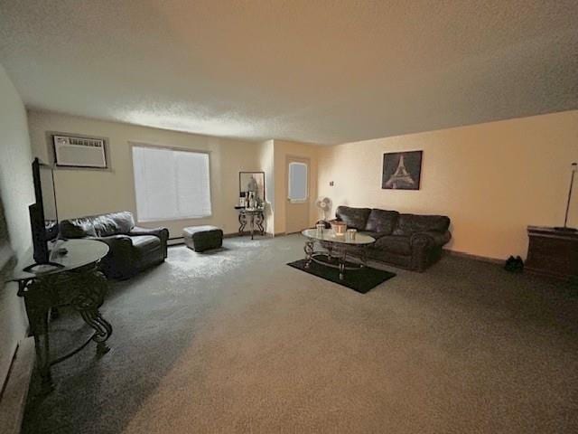 living room with a textured ceiling, carpet flooring, and an AC wall unit