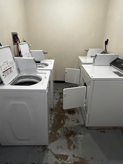 laundry room featuring separate washer and dryer