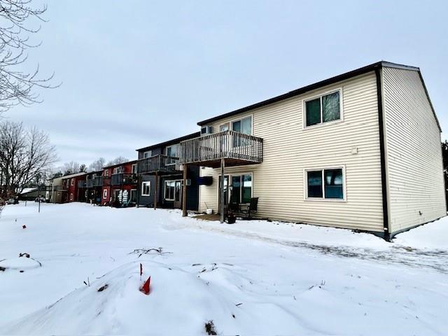 view of snow covered house