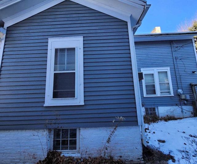 view of snow covered property