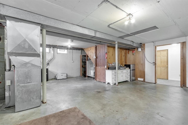 basement featuring heating unit