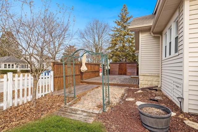 view of yard featuring a wooden deck