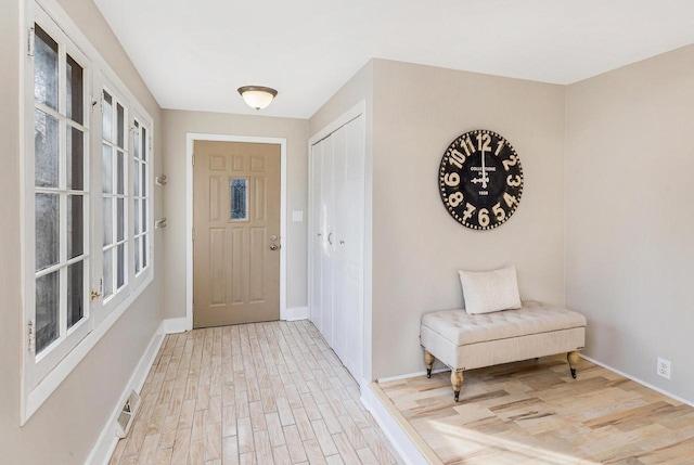 foyer featuring hardwood / wood-style flooring