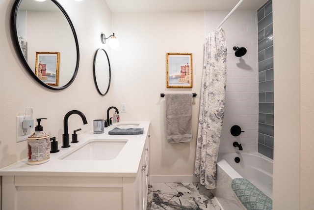 bathroom with shower / bath combo with shower curtain and vanity