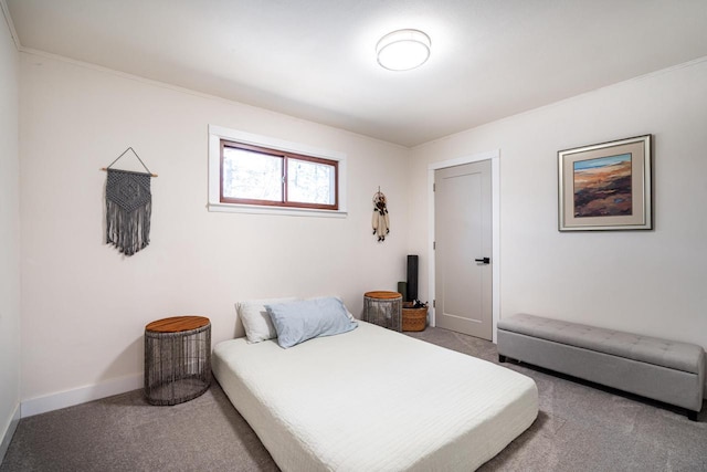 bedroom featuring carpet floors and crown molding