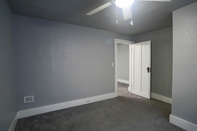 carpeted empty room with ceiling fan