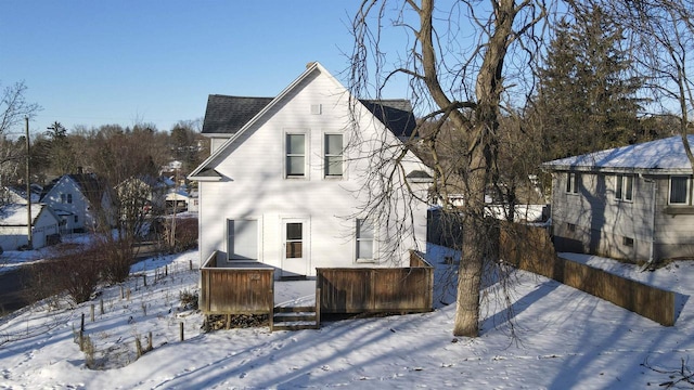 view of snow covered property