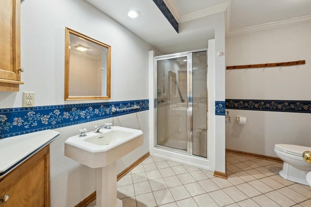 bathroom featuring crown molding, a shower with shower door, tile patterned floors, and toilet