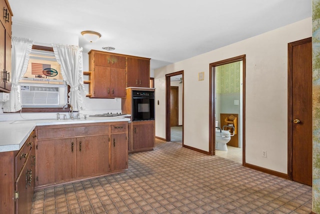 kitchen featuring black oven